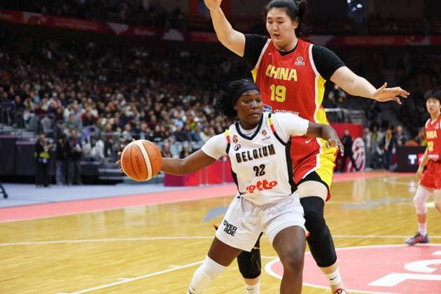 Belgium s Bethy Mununga and China Ziyu Zhang fight for the ball during a basket game between China and Belgium s national team, Nationalteam Belgian Cats, in Wuhan, China, on Thursday 12 March 2026, the second game (out of 5) of the qualifications phase for the World Cup Basket tournament. NIKOLAxKRSTIC  x167247521x