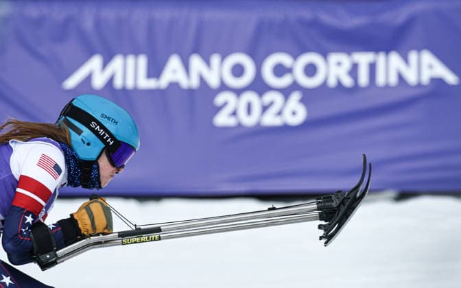ITALY, CORTINA D AMPEZZO - MARCH 12, 2026: Kelsey O Driscoll of the USA competes in a women s para alpine skiing giant slalom standing event at the Tofane Alpine Skiing Centre during the 2026 Winter Paralympic Games, in Cortina d Ampezzo, Province of Belluno. Mikhail Tereshchenko TASS  89926094