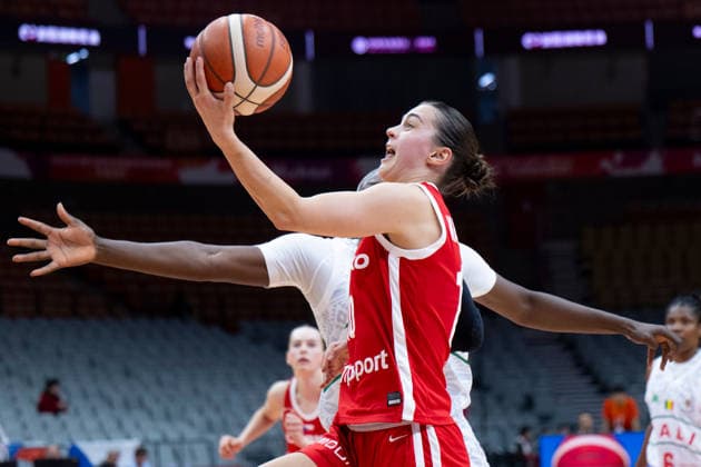 (260312) -- WUHAN, March 12, 2026 -- Eliska Hamzova of the Czech Republic goes for a lay-up during the group A match between the Czech Republic and Mali at FIBA Women s World Cup Qualifying Tournaments in Wuhan, central China s Hubei Province, Feb. 12, 2026. ) (SP)CHINA-WUHAN-FIBA-WOMEN S WORLD CUP 2026-QUALIFYING-MLI VS CZE(CN) WuxZhizun 