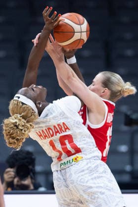 (260312) -- WUHAN, March 12, 2026 -- Maimouna Haidara (L) of Mali vies with Petra Holesinska of the Czech Republic during the group A match between the Czech Republic and Mali at FIBA Women s World Cup Qualifying Tournaments in Wuhan, central China s Hubei Province, Feb. 12, 2026. ) (SP)CHINA-WUHAN-FIBA-WOMEN S WORLD CUP 2026-QUALIFYING-MLI VS CZE(CN) WuxZhizun 