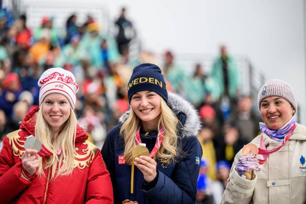 260312 Varvara Voronchikhina of Russia, Ebba Arsjö of Sweden and Aurelie Richard of France celebrate on the podium competing in the women s para alpine giant slalom during day 6 of the Milano Cortina 2026 Winter Paralympic Games on March 12, 2026 in Cortina. Photo: Maxim Thore BILDBYRAN kod MT MT1020 alpint alpine skiing paralympic games paralympics paralympiska spel paralympiske leker vinter-paralympics winter paralympics milano cortina 2026 milano cortina 2026 winter paralympic games 6 bbeng storslalom jubel *** 260312 Varvara Voronchikhina of Russia, Ebba Arsjö of Sweden and Aurelie Richard of France celebrate on the podium competing in the women s para alpine giant slalom during day 6 of the Milano Cortina 2026 Winter Paralympic Games on March 12, 2026 in Cortina Photo Maxim Thore BILDBYRAN kod MT MT1020 alpint alpine skiing paralympic games paralympiska spel paralympiske leker vinter paralympics winter paralympics milano cortina 2026 milano cortina 2026 winter paralympic games 6 bbeng storslalom jubel  Copyright: MAXIMxTHORE BB260312MT068
