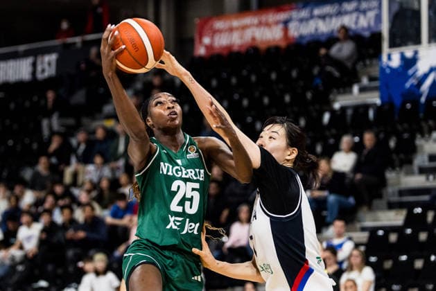 LYON-VILLEURBANNE, FRANCE - MARCH 12: Victoria Macaulay (Nigeria, 25) shoots the ball against Jisu Park (Republic of Korea, 7) during the FIBA Women™s World Cup Qualifying Tournament match between Republic of Korea (KOR) vs. Nigeria (NGR) at Astroballe on matchday 2 of the FIBA Women™s World Cup Qualifying Tournament on March 12, 2026 in Lyon-Villeurbanne, France. France Copyright: xSteffiexWunderlx