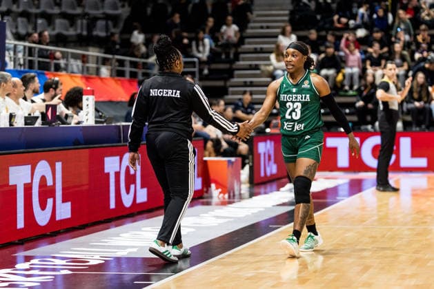 LYON-VILLEURBANNE, FRANCE - MARCH 12: Rena Wakama (Head Coach Nigeria) and Ezinne Kalu (Nigeria, 23) high five during the FIBA Women™s World Cup Qualifying Tournament match between Republic of Korea (KOR) vs. Nigeria (NGR) at Astroballe on matchday 2 of the FIBA Women™s World Cup Qualifying Tournament on March 12, 2026 in Lyon-Villeurbanne, France. France Copyright: xSteffiexWunderlx