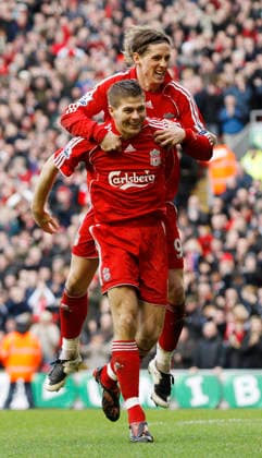 Steven Gerrard of Liverpool celebrates scoring the third goal with Fernando Torres Copyright: x-x