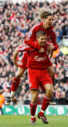Steven Gerrard of Liverpool celebrates scoring the third goal with Fernando Torres Copyright: x-x