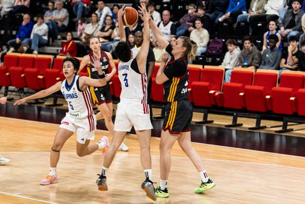 LYON-VILLEURBANNE, FRANCE - MARCH 12: Nina Rosemeyer (Germany, 33) controls the ball against Afril Bernardino (Philippines, 3) during the FIBA Women™s World Cup Qualifying Tournament match between Philippines (PHI) vs. Germany (GER) at Astroballe on matchday 2 of the FIBA Women™s World Cup Qualifying Tournament on March 12, 2026 in Lyon-Villeurbanne, France. France Copyright: xSteffiexWunderlx