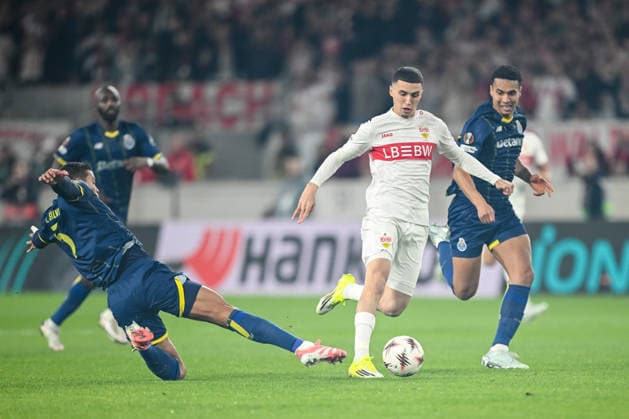 Jan Bednarek (FC Porto) and Bilal El Khannouss (VfB Stuttgart) battle for the ball during the UEFA Europa League 2025 26 Round of 16 First Leg match between VfB Stuttgart and FC Porto at Stuttgart Arena on March 12, 2026 in Stuttgart, Germany. (Photo by Harry Langer DeFodi Images) -