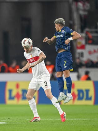 Ramon Hendriks (VfB Stuttgart) and William Gomes (FC Porto) battle for the ball during the UEFA Europa League 2025 26 Round of 16 First Leg match between VfB Stuttgart and FC Porto at Stuttgart Arena on March 12, 2026 in Stuttgart, Germany. (Photo by Harry Langer DeFodi Images) -