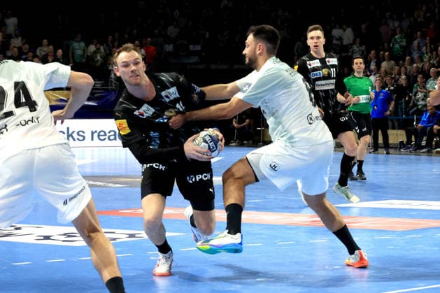 DEU, Machineseeker EHF Champions League, Fuechse Berlin vs. HBC Nantes, 12.03.2026, Max-Schmeling-Halle, Berlin, DEU, Machineseeker EHF Champions League, Fuechse Berlin vs. HBC Nantes, im Bild Mathias Gidsel (Fuechse Berlin 19), Ian Tarrafeta (HBC Nantes 6)