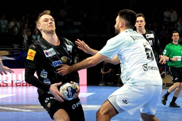 DEU, Machineseeker EHF Champions League, Fuechse Berlin vs. HBC Nantes, 12.03.2026, Max-Schmeling-Halle, Berlin, DEU, Machineseeker EHF Champions League, Fuechse Berlin vs. HBC Nantes, im Bild Mathias Gidsel (Fuechse Berlin 19), Ian Tarrafeta (HBC Nantes 6)