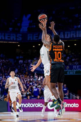 ESP: Real Madrid v Valencia Basket. Euroleague. Trey Lyles of Real Madrid and Moore (Valencia) during the Euroleague match, between Real Madrid and Valencia Basket played at Movistar Arena Stadium on March 12, 2026 in Madrid Spain Madrid Spain Basketball Copyright: xAlbaxPachecox xAgenciaxLOFx