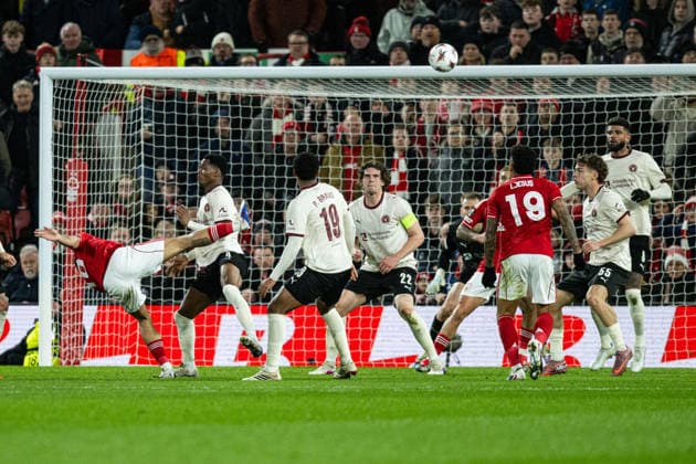 12th March 2026; The City Ground, Nottingham, England; UEFA Europa League Football, Nottingham Forest versus Midtjylland; Morgan Gibbs-White of Nottingham Forest falls as he attempts a shot from a high ball  GodfreyxPitt Content restricted for UK based newspaper