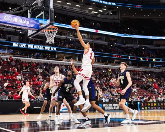 Basketball, NCAA, Wisconsin Badgers - Washington Huskies March 12, 2026, Chicago, Illinois, USA: Wisconsin basketball player NICK BOYD goes in for a layup during the third round game against Washington during the 2026 TIAA Big Ten Men s Basketball Tournament at the United Center. 2026 TIAA Big Ten Men s Basketball Tournament: Wisconsin 85: Washington: 82  - ZUMAw173 20260312_zsp_w173_022 Copyright: xLukexWelshx