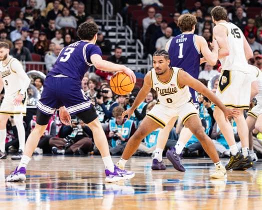 March 12, 2026, Chicago, Illinois, USA: Northwestern basketball player JAKE WEST (3) is guarded by C.J. COX of Purdue during the third round game of the 2026 TIAA Big Ten Men s Basketball Tournament at the United Center. 2026 TIAA Big Ten Men s Basketball Tournament: Purdue 81: Northwestern: 68  - ZUMAw173 20260312_zsp_w173_045 Copyright: xLukexWelshx