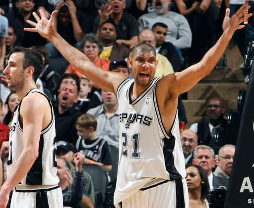 Mar 17, 2008 - San Antonio, Texas, USA - Spurs TIM DUNCAN reacts to a foul during second half action against the Celtics as teammate Manu Ginobili walks past Monday March 17, 2008 at the AT&T Center. The Celtics won 93-91. Copyright: xEdwardxA.xOrnelasx