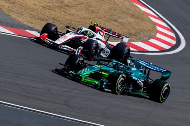SHANGHAI, CHINA - MARCH 13: Lance Stroll of Canada driving the (18) Aston Martin F1 Team AMR26 Honda leads Oliver Bearman of Great Britain driving the (87) Haas F1 VF-26 Ferrari during practice ahead of the F1 Grand Prix of China at Shanghai International Circuit on March 13, 2026 in Shanghai, China. (Photo by Yu Chun Christopher Wong Eurasia Images) Shanghai China Copyright: x2026xEurasiaxSportxImagesx jp-en-EuSpIm-cw6_F1SHA_20260313_3928