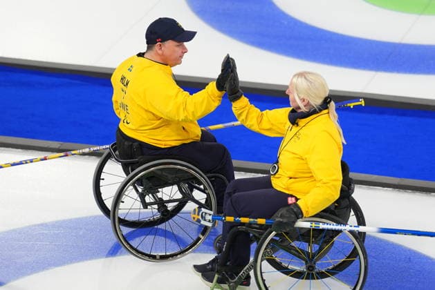 CORTINA, ITALIEN 20260313 Sveriges Marcus Holm och Kristina Ulander under semifinalen i curling mixad mellan Kina och Sverige i Paralympics pa Cortina Curling Olympic Stadium. *** Bilden ingar i SPORTPAKET. För övriga BETALBILD *** CORTINA ITALIEN x10500x *** CORTINA, ITALY 20260313 Swedens Marcus Holm and Kristina Ulander during the mixed curling semi-final between China and Sweden in the Paralympics at the Cortina Curling Olympic Stadium Picture in SPORT PACKAGE For others PAY PICTURE CORTINA ITALY x10500x  Copyright: xMagnusxLejhall ParasportxSverige TT TTx PARALYMPICS 2026 CURLING
