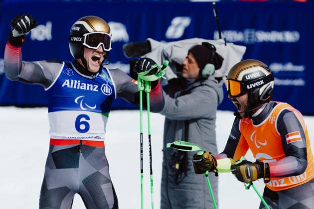 PARALYMPICS - Winter Paralympics Milano Cortina 2026 CORTINA D AMPEZZO,ITALY,13.MAR.26 - PARALYMPICS, SNOWBOARD - Paralympic Winter games, Winterspiele,Spiele, Summer games Milano Cortina 2026, banked slalom, men. Image shows Johannes Aigner and guide Nico Haberl (AUT).  GEPAxpictures xMatthiasxTrinkl