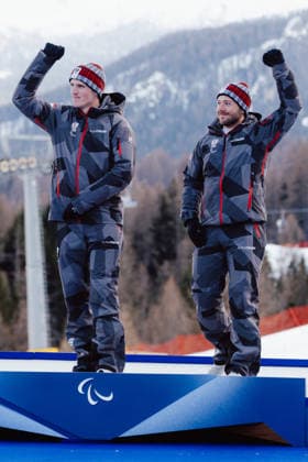 PARALYMPICS - Winter Paralympics Milano Cortina 2026 CORTINA D AMPEZZO,ITALY,13.MAR.26 - PARALYMPICS, ALPINE SKIING - Paralympic Winter games, Winterspiele,Spiele, Summer games Milano Cortina 2026, giant slalom, men, medal ceremony. Image shows Johannes Aigner and guide Nico Haberl (AUT).  GEPAxpictures xMatthiasxTrinkl