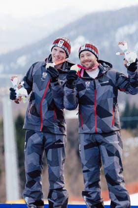 PARALYMPICS - Winter Paralympics Milano Cortina 2026 CORTINA D AMPEZZO,ITALY,13.MAR.26 - PARALYMPICS, ALPINE SKIING - Paralympic Winter games, Winterspiele,Spiele, Summer games Milano Cortina 2026, giant slalom, men, medal ceremony. Image shows Johannes Aigner and guide Nico Haberl (AUT).  GEPAxpictures xMatthiasxTrinkl