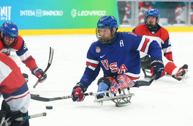 March 13, 2026, Milan, Lombardy, Italy: DECLAN FARMER 16 of USA shoots and scores his side s fifth goal the Semi Final game between Team United States (USA) and Team Czechia (CZE) at the Milano Cortina 2026 Paralympic Winter games, Winterspiele,Spiele, Summer games USA won 6:1 and advances to the Final. Milan Italy - ZUMAc179 20260313_oly_c179_023 Copyright: xMickaelxChavetx