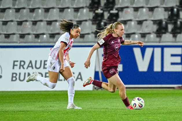 Nicole Ojukwu (SC Freiburg, 06), Emoeke Papai (1. FC Nuernberg, 15) am Ball. GER, SC Freiburg - 1. FC Nuernberg, Frauen-Fussball, Google Pixel Frauen-Bundesliga, 20. Spieltag, Saison 2025 2026, 13.03.2026 DFB REGULATIONS PROHIBIT ANY USE OF PHOTOGRAPHS AS IMAGE SEQUENCES AND OR QUASI-VIDEO GER, SC Freiburg - 1. FC Nuernberg, Frauen-Fussball, Google Pixel Frauen-Bundesliga, 20. Spieltag, Saison 2025 2026, 13.03.2026 Freiburg Copyright: xEibner-Pressefoto ThomasxHessx EP_THS