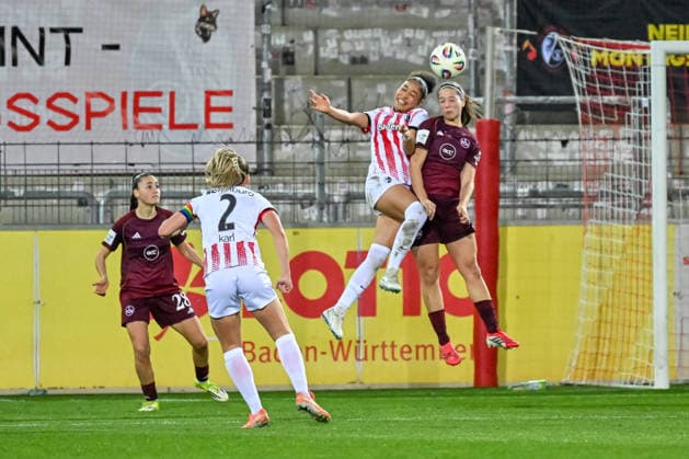 Nicole Ojukwu (SC Freiburg, 06), Laura Miller (1. FC Nuernberg, 09) im Luftduell um den Ball. GER, SC Freiburg - 1. FC Nuernberg, Frauen-Fussball, Google Pixel Frauen-Bundesliga, 20. Spieltag, Saison 2025 2026, 13.03.2026 DFB REGULATIONS PROHIBIT ANY USE OF PHOTOGRAPHS AS IMAGE SEQUENCES AND OR QUASI-VIDEO GER, SC Freiburg - 1. FC Nuernberg, Frauen-Fussball, Google Pixel Frauen-Bundesliga, 20. Spieltag, Saison 2025 2026, 13.03.2026 Freiburg Copyright: xEibner-Pressefoto ThomasxHessx EP_THS