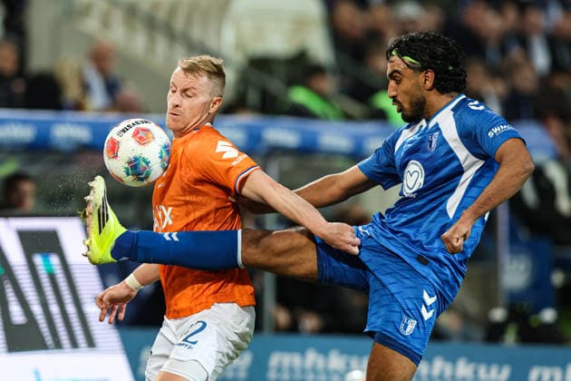 Rayan Ghrieb (1. FC Magdeburg,29) gegen Fabian Holland (SV Darmstadt 98,32) - 2. Fußball Bundesliga Saison 2025-2026 1. FC Magdeburg vs. SV Darmstadt 98 in der Avnet Arena in Magdeburg - Aktion,Fußball,Mann,Männer,Deutschland,13.03.2026