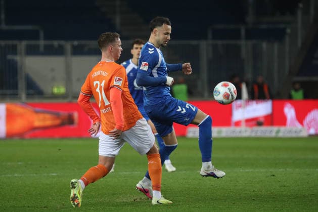 13.03.2026, xgox, Fussball 2. Bundesliga, 1. FC Magdeburg - SV Darsmtadt 98 emspor, v.l. Niklas Schmidt (Darmstadt, 31), Falko Michel (Magdeburg, 21) (DFL DFB REGULATIONS PROHIBIT ANY USE OF PHOTOGRAPHS as IMAGE SEQUENCES and or QUASI-VIDEO) Magdeburg