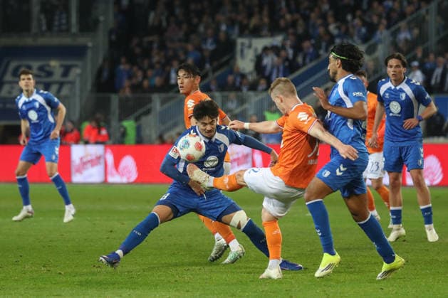 13.03.2026, xgox, Fussball 2. Bundesliga, 1. FC Magdeburg - SV Darsmtadt 98 emspor, v.l. Laurin Ulrich (Magdeburg, 8), Fabian Holland (Darmstadt, 32) (DFL DFB REGULATIONS PROHIBIT ANY USE OF PHOTOGRAPHS as IMAGE SEQUENCES and or QUASI-VIDEO) Magdeburg