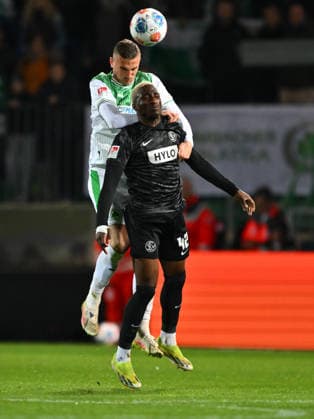 13.03.2026 - Fussball - Saison 2025 2026 - 2. Fussball - Bundesliga - 26. Spieltag: SpVgg Greuther Fürth ( Kleeblatt SGF ) - SV Elversberg SVE - Sportfoto Zink - xwoxzix - DFL regulations prohibit any use of photographs as image sequences and or quasi-video - only for editorial use - Philipp Ziereis (4, SpVgg Greuther Fürth ) David Mokwa Ntusu (42, SV Elversberg )