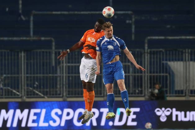 13.03.2026, xgox, Fussball 2. Bundesliga, 1. FC Magdeburg - SV Darsmtadt 98 emspor, v.l. Patric Pfeiffer (Darmstadt, 6), Alexander Ahl Holmstroem (Magdeburg, 11) Zweikampf, Duell, Kampf, tackle (DFL DFB REGULATIONS PROHIBIT ANY USE OF PHOTOGRAPHS as IMAGE SEQUENCES and or QUASI-VIDEO) Magdeburg