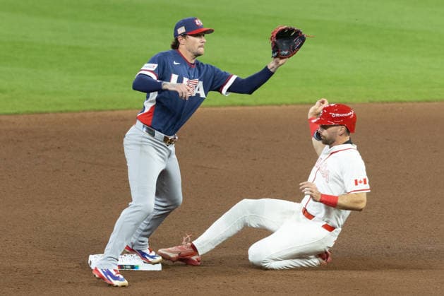 Edouard Julien (R) of Canada slides past Brice Turang of the United States during a World Baseball Classic game between the United States and Canada at Daikin Park in Houston, Texas, United States, 13 March 2026. World Baseball Classic: United States - Canada !ACHTUNG: NUR REDAKTIONELLE NUTZUNG!  Copyright: xCarlosxRamirezx AME3906 20260314-55019692313_1