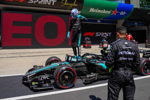 CHINA-MOTORSPORTS F1-SHANGHAI Mercedes™ George Russell standing on his F1 car after winning the Sprint in the pits at Shanghai International Circuit during the F1 Chinese Grand Prix, Shanghai, China, March 14, 2026. NEXPHER Peter Li SHANGHAI