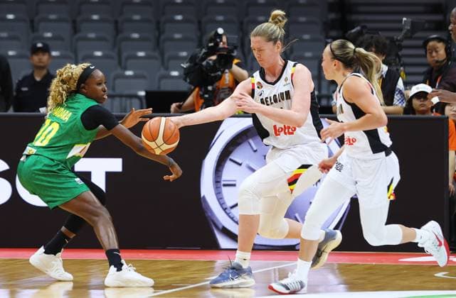 Mali s Maimouna Haidara and Belgium s Emma Meesseman fight for the ball during a basket game between Belgium s national team, Nationalteam Belgian Cats and Mali, in Wuhan, China, on Saturday 14 March 2026, the third game (out of 5) of the qualifications phase for the World Cup Basket tournament. NIKOLAxKRSTIC  x167427695x