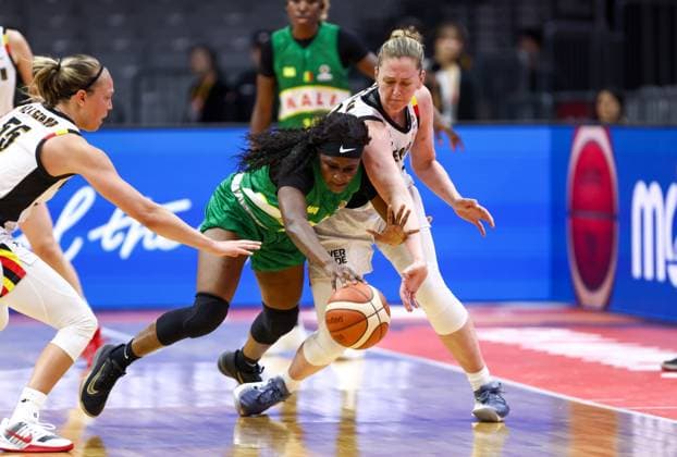 Belgium s Emma Meesseman and Mali s Djeneba N Daiye fight for the ball during a basket game between Belgium s national team, Nationalteam Belgian Cats and Mali, in Wuhan, China, on Saturday 14 March 2026, the third game (out of 5) of the qualifications phase for the World Cup Basket tournament. NIKOLAxKRSTIC  x167428316x