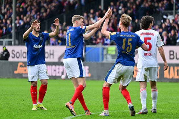 14.03.2026, Fußball, Herren, 2.BL (Bundesliga), Saison 2025 2026, Holstein Kiel - 1. FC Nürnberg, 26. Spieltag Kasper Davidsen erzielt den 2:2 Ausgleich für Holstein Kiel und Jubelt Kiel, Holstein-Stadion Holstein-Stadion Schleswig-Holstein Deutschland