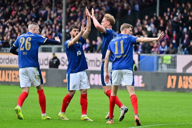14.03.2026, Fußball, Herren, 2.BL (Bundesliga), Saison 2025 2026, Holstein Kiel - 1. FC Nürnberg, 26. Spieltag Kasper Davidsen erzielt den 2:2 Ausgleich für Holstein Kiel und Jubelt Kiel, Holstein-Stadion Holstein-Stadion Schleswig-Holstein Deutschland