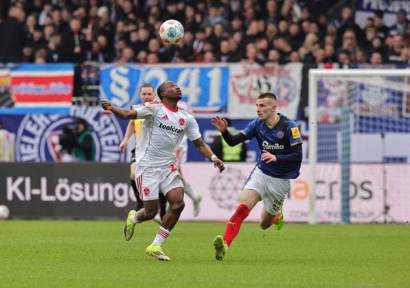 14.03.2026 - Fussball - Saison 2025 2026 - 2. Fussball - Bundesliga - 26. Spieltag: Holstein Kiel KSV Kieler Sportvereinigung Holstein von 1900 ( Störche ) - 1. FC Nürnberg FCN ( Club ) - Sportfoto Zink DaMa - xdaxmax - DFL regulations prohibit any use of photographs as image sequences and or quasi-video - only for editorial use - Mohamed Ali Zoma (23, 1. FC Nürnberg FCN ) David Zec (26, Holstein Kiel )