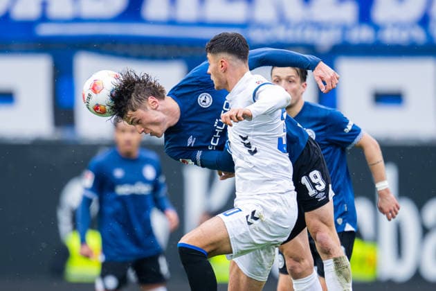 14.03.2026 - Fußball, 2025 2026, 2. Bundesliga, 26. Spieltag, DSC Arminia Bielefeld - SC Paderborn 07: (L-R) Maximilian Großer (Bielefeld), Stefano Marino (Paderborn) DFL REGULATIONS PROHIBIT ANY USE OF PHOTOGRAPHS AS IMAGE SEQUENCES AND OR QUASI-VIDEO.