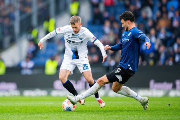 14.03.2026 - Fußball, 2025 2026, 2. Bundesliga, 26. Spieltag, DSC Arminia Bielefeld - SC Paderborn 07: (L-R) Sebastian Klaas (Paderborn), Maximilian Bauer (Bielefeld) DFL REGULATIONS PROHIBIT ANY USE OF PHOTOGRAPHS AS IMAGE SEQUENCES AND OR QUASI-VIDEO.