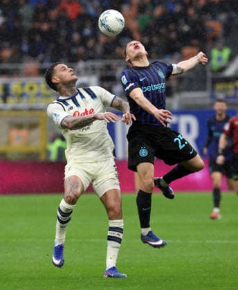 March 14, 2026, Milan, MILAN: Atalanta™s Gianluca Scamacca (L) challenges for the ball with Inter Milan™s NicolÃ² Barella during the Italian serie A soccer match between Inter and Atalanta at Giuseppe Meazza stadium in Milan, 14 March 2026..ANSA MATTEO BAZZI. Soccer; Serie A: Inter Vs Atalanta  - ZUMAa110 20260314_zaf_a110_021 Copyright: xMatteoxBazzix