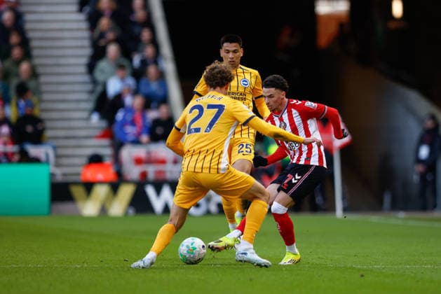 Sunderland v Brighton and Hove Albion, Premier League Chemsdine Talbi of Sunderland looks to beat Mats Wieffer of Brighton & Hove Albion during the Premier League match between Sunderland and Brighton and Hove Albion at the Stadium Of Light, Sunderland, UK on 14 March 2026. Sunderland Stadium Of Light Tyne and Wear UK Editorial use only DataCo restrictions apply See www.football-dataco.com , Copyright: xCraigxCowanx PSI-23898-0061