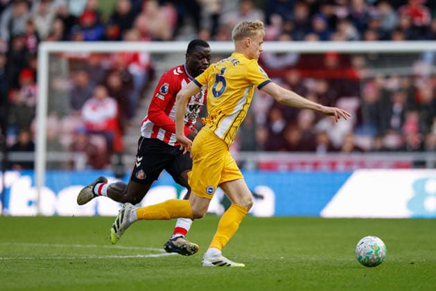 Sunderland v Brighton and Hove Albion, Premier League Jan Paul van Hecke of Brighton & Hove Albion under pressure from Brian Brobbey of Sunderland during the Premier League match between Sunderland and Brighton and Hove Albion at the Stadium Of Light, Sunderland, UK on 14 March 2026. Sunderland Stadium Of Light Tyne and Wear UK Editorial use only DataCo restrictions apply See www.football-dataco.com , Copyright: xCraigxCowanx PSI-23898-0066