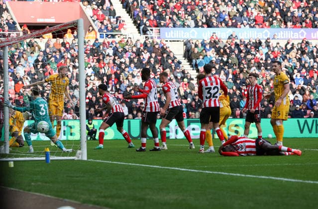 Sunderland, England, 14th March 2026. Yankuba Minteh (L) of Brighton and Hove Albion shoots to score the first goal during the Sunderland vs Brighton and Hove Albion Premier League match at the Stadium Of Light, Sunderland. Picture credit should read: Nigel Roddis Sportimage EDITORIAL USE ONLY. No use with unauthorised audio, video, data, fixture lists, club league logos or live services. Online in-match use limited to 120 images, no video emulation. No use in betting, games or single club league player publications. SPI_020_NR_SUND_BRIG SPI-4601-0020