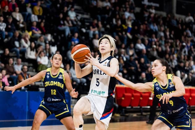 LYON-VILLEURBANNE, FRANCE - MARCH 14: Heji An (Republic of Korea, 5) controls the ball against Manuela Rios (Colombia, 9) during the FIBA Women™s World Cup Qualifying Tournament match between Republic of Korea (KOR) vs. Colombia (COL) at Astroballe on matchday 3 of the FIBA Women™s World Cup Qualifying Tournament on March 14, 2026 in Lyon-Villeurbanne, France. France Copyright: xSteffiexWunderlx