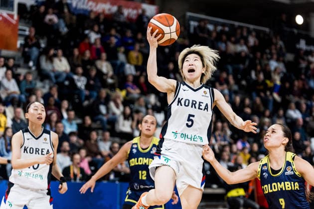 LYON-VILLEURBANNE, FRANCE - MARCH 14: Heji An (Republic of Korea, 5) shoots the ball against Manuela Rios (Colombia, 9) defense during the FIBA Women™s World Cup Qualifying Tournament match between Republic of Korea (KOR) vs. Colombia (COL) at Astroballe on matchday 3 of the FIBA Women™s World Cup Qualifying Tournament on March 14, 2026 in Lyon-Villeurbanne, France. France Copyright: xSteffiexWunderlx