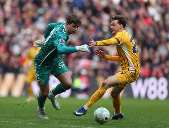 Sunderland, England, 14th March 2026. Melker Ellborg (L) of Sunderland in action with Maxim De Cuyper of Brighton and Hove Albion during the Sunderland vs Brighton and Hove Albion Premier League match at the Stadium Of Light, Sunderland. Picture credit should read: Nigel Roddis Sportimage EDITORIAL USE ONLY. No use with unauthorised audio, video, data, fixture lists, club league logos or live services. Online in-match use limited to 120 images, no video emulation. No use in betting, games or single club league player publications. SPI_025_NR_SUND_BRIG SPI-4601-0025