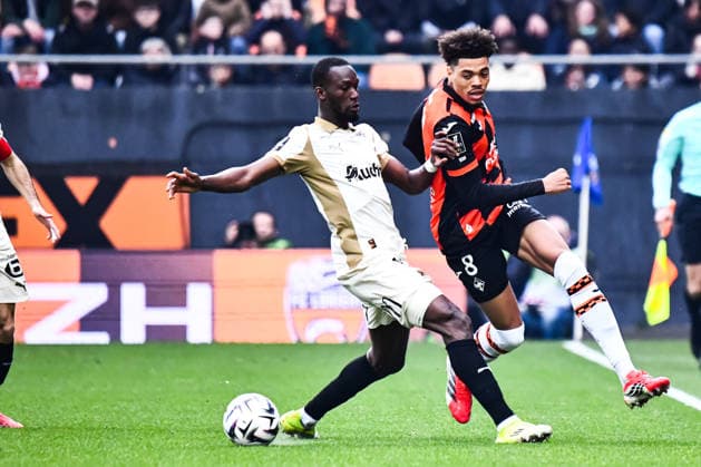 FOOTBALL : FC Lorient vs RC Lens - Ligue 1 - JournÃ e 26 - 14 03 2026 Noah Cadiou (FC Lorient) Abdallah Sima (RC Lens) LorientFrance  Copyright: xBaptistexAutissierx