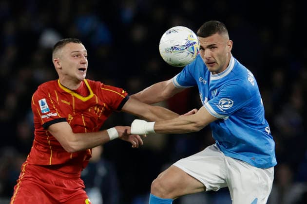 Italy: Serie a football match SSC Napoli vs Lecce Lecce s Serbian forward Nikola Stulic challenges for the ball with Napoli s Italian defender Alessandro Buongiorno during the Serie A football match between SSC Napoli vs Lecce at the Diego Armando Maradona Stadium in Naples on March 14, 2026. _BPH8534 Copyright: xAntonioxBalascox